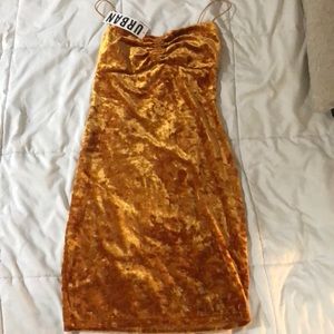 A gold velvet soft dress